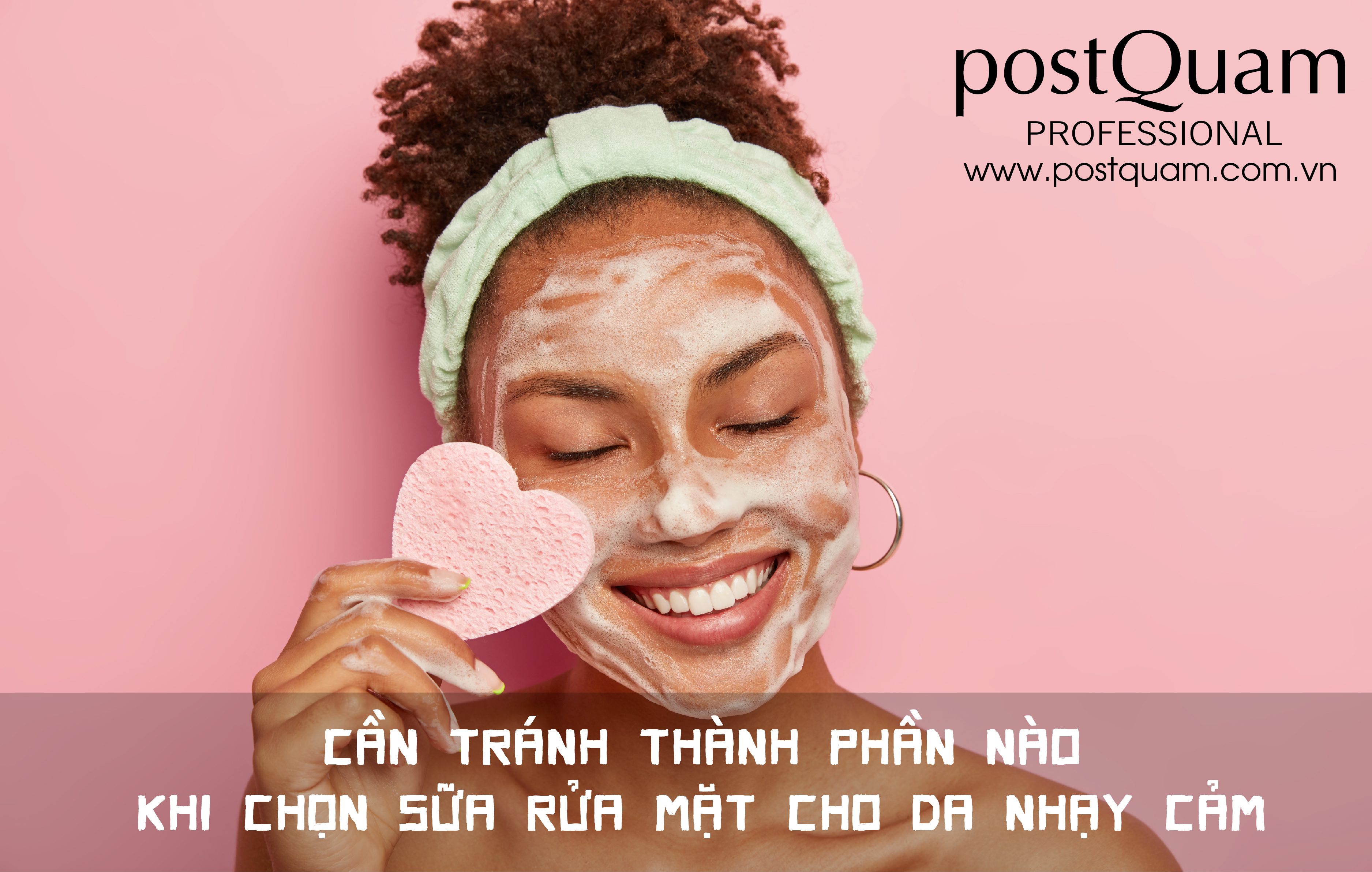 positive dark skinned woman with afro combed hair wears headband cares about facial skin wipes cheek with cosmetic sponge keeps eyes shut with pleasure 01